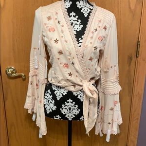 Pink bell sleeve top from River Island